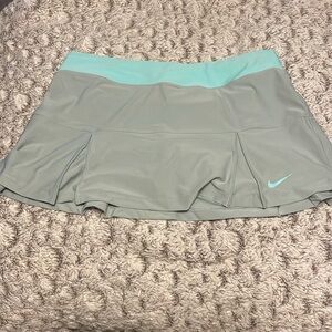 Nike grey skort with teal waistband